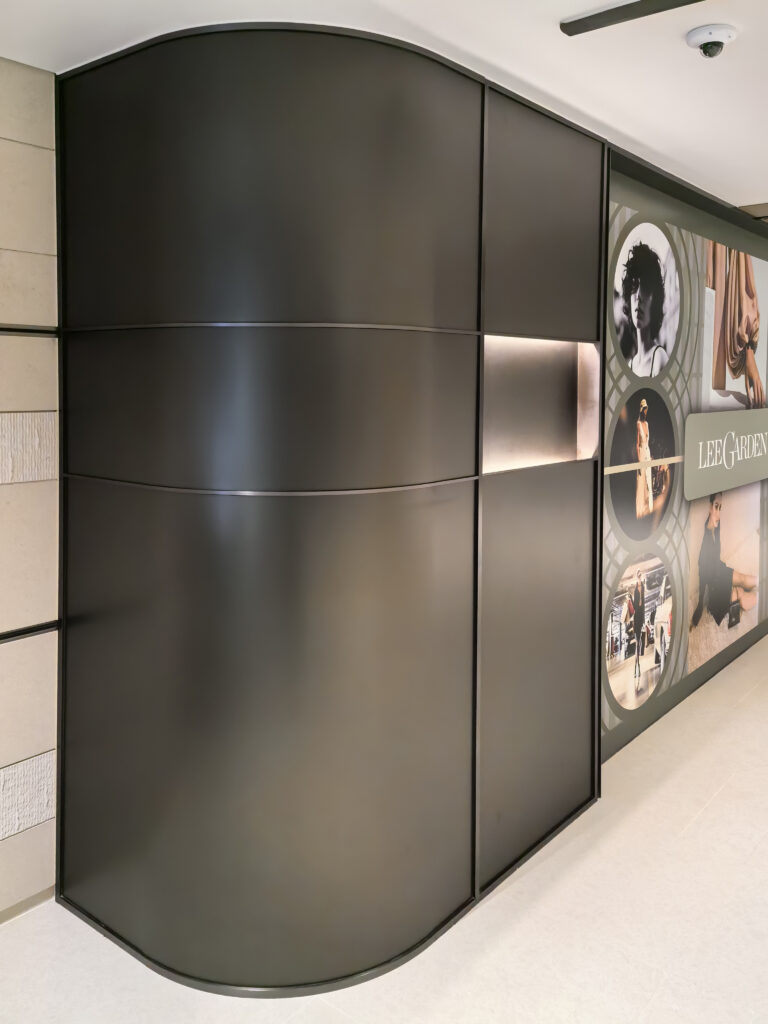 curved stainless steel wall panelling custom fabrication for general contractor